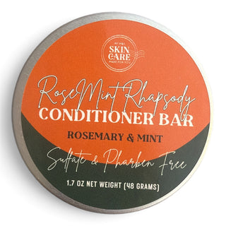 RoseMint Rhapsody Conditioner Bar tin lid with orange and dark green front label reading Rosemary & Mint, Sulfate & Paraben Free
